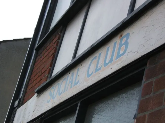 In this image building, wall and sky.