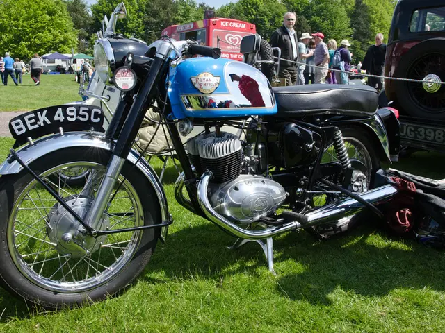 These are the motorbikes and a car, which are parked. This looks like a luggage bag. I can see an...