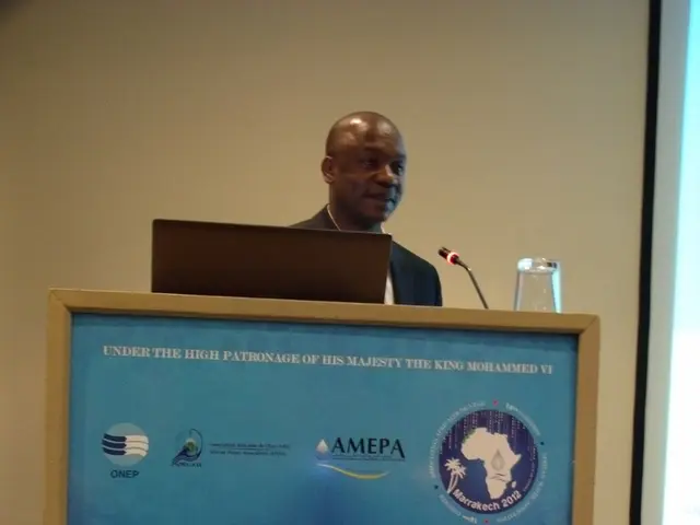 In this image, we can see a banner. In the banner, we can see some figures and text. Here we can...