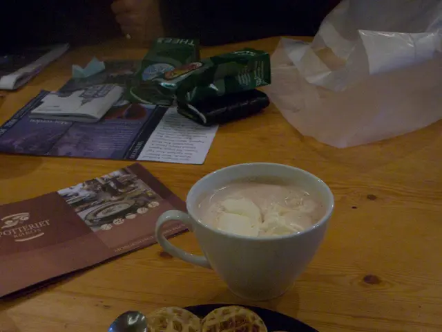 In the image we can see there are food items kept on the plate and there is spoon kept on the food...