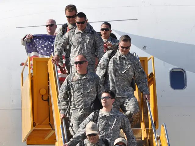 In this image we can see a flight with steps. There are many people. Some are wearing caps. Some...