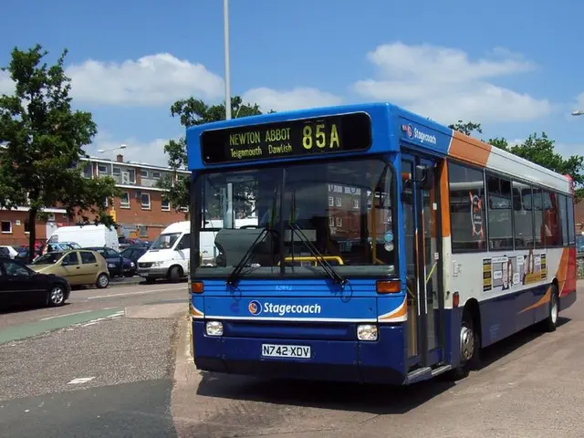 In the image we can see there are cars parked on the road and there is a bus parked on the road....