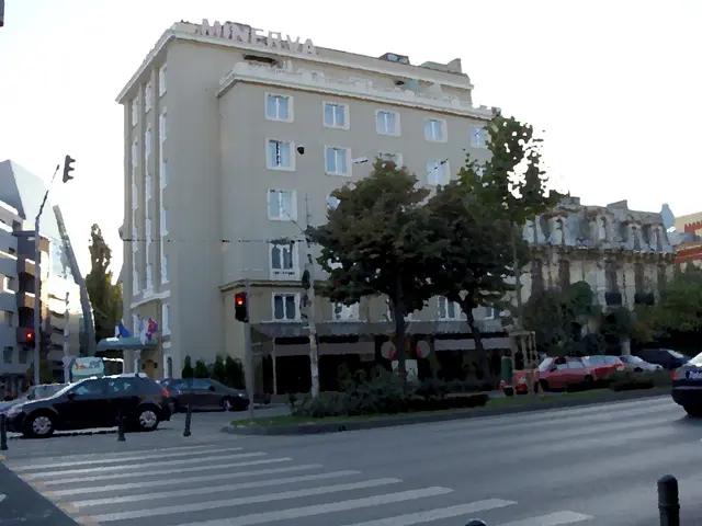 This edited image is clicked on the road. There are vehicles moving on the road. On the divider...