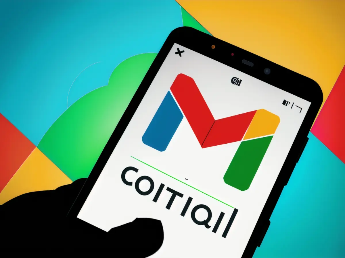 Smartphone display displaying the Gmail symbol against a backdrop of Google's distinctive hues